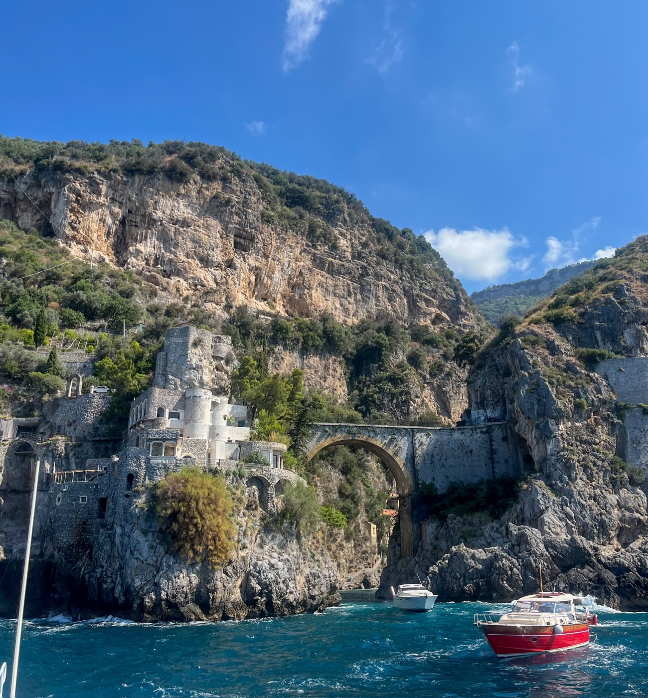 Boats below the cliffs of the Amalfi coast